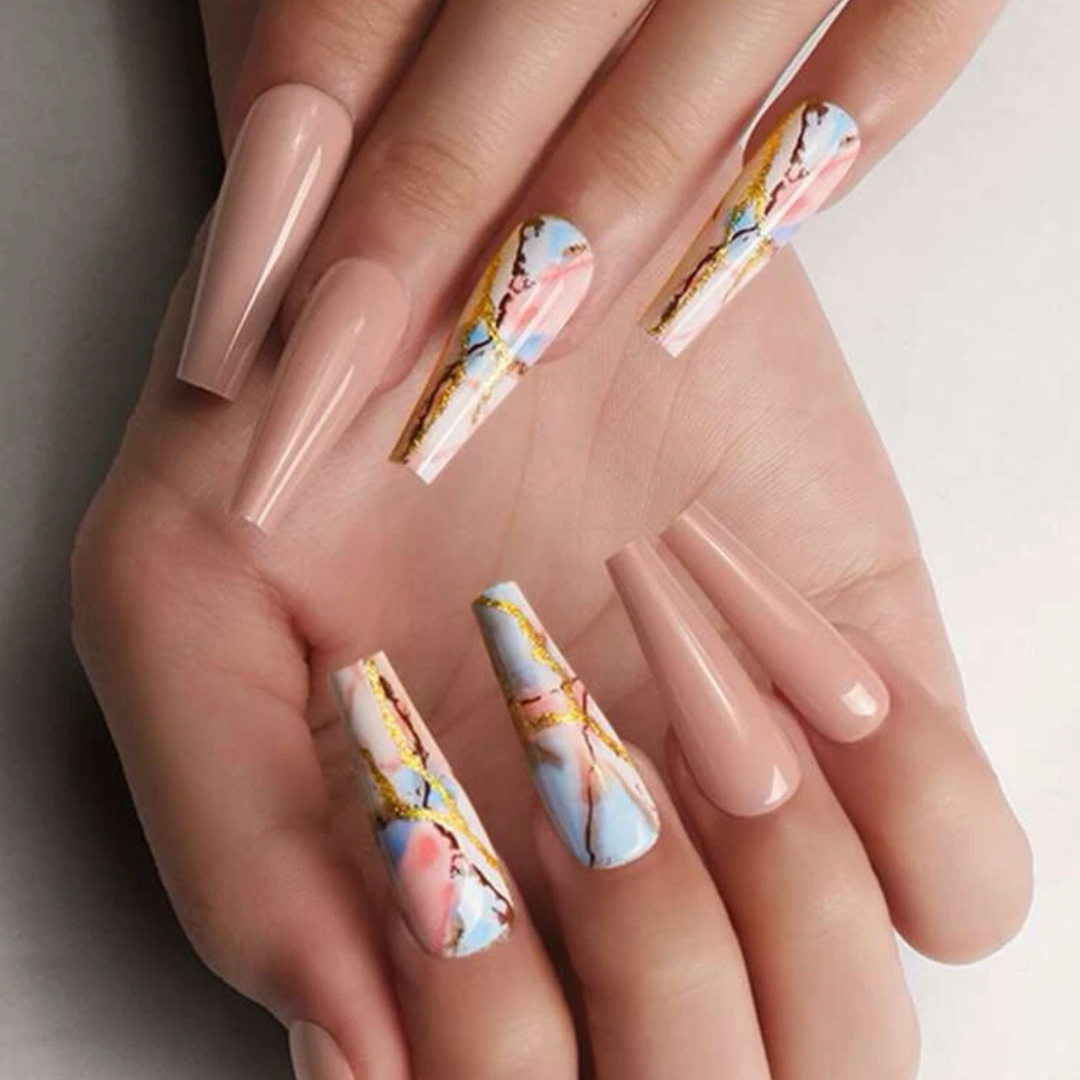 long coffin nude coloured press on nails with pink and blue marble accent nails