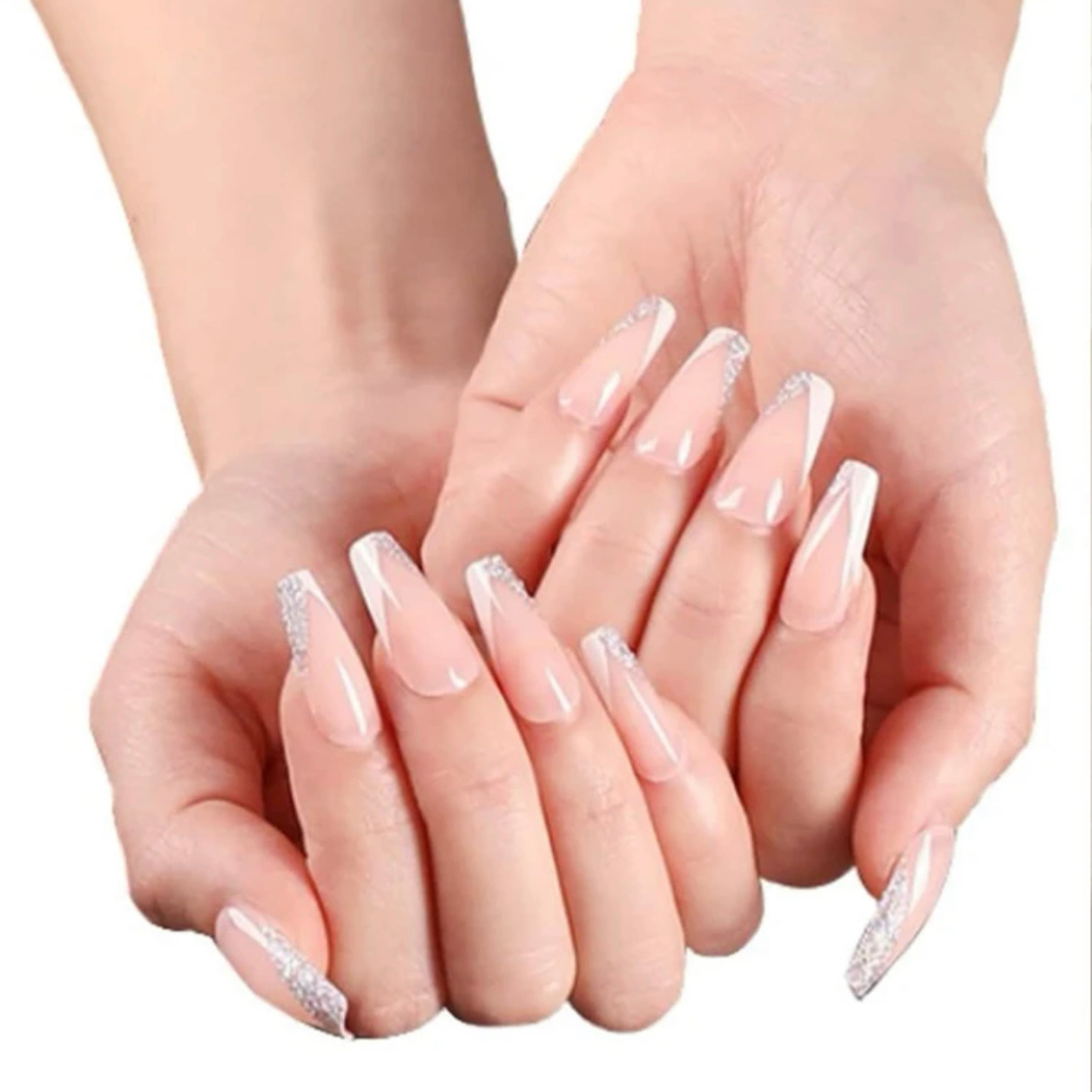 short square press on nails with a french tip that is v-shaped and half white half silver